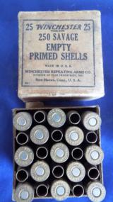 WINCHESTER FULL BOX OF 250 SAVAGE EMPTY PRIMED SHELLS- 1 of 8