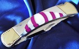 BUCK-110C CUSTOM MICHAEL PRATER ~ PAINTED PONY- Folding Knife signed-NEW in TUBE
PEARL & SUGILITE ~~STUNNING! - 8 of 11