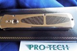 PRO-TECH Custom
Edition "GODSON"
AUTO Knife Solid Mirror Polished TITANIUM
with Carbon Fiber Inlays NOS - 12 of 15