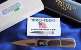 PRO-TECH Custom
Edition "GODSON"
AUTO Knife Solid Mirror Polished TITANIUM
with Carbon Fiber Inlays NOS - 5 of 15