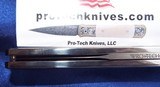 PRO-TECH Custom
Edition "GODSON"
AUTO Knife Solid Mirror Polished TITANIUM
with Carbon Fiber Inlays NOS - 13 of 15