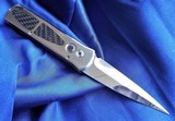 PRO-TECH Custom
Edition "GODSON"
AUTO Knife Solid Mirror Polished TITANIUM
with Carbon Fiber Inlays NOS - 1 of 15