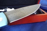 PRO-TECH CUSTOM KNIVES
BR-1
"WISKERS"
BOLSTER RELEASE AUTO ~ TITANIUM ~ MOTHER OF PEARL ~ NICHOLS DAMASCUS NEW! - 13 of 14