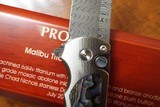 PRO-TECH CUSTOM MALIBU TITANIUM
FLIPPER ~ PAUA ABALONE INLAYS **STUNNING** NIB - 3 of 5