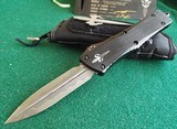 MARFIONE CUSTOM (Microtech) COMBAT TROODON DOUBLE EDGE NICHOLS DAMASCUS ANODIZED HEFTED ALLOY WITH BRASS RINGED HARDWARE 02/2018 - 1 of 11