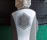 HERETIC CUSTOM MANTICORE "E"
Auto OTF Knife ~ Hand rubbed Stainless
DLC 2-tone handle Vegas Forge Ball Bearing Damascus (ser # 3 of 15 - 6 of 8