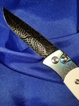 PRO-TECH
BREND 2 CUSTOM
Titanium Custom "Flomascus" frame ~ Ivory Micarta Inlays ~ Nichols Mosaic Damascus Blade. Authorized Dealer - 2 of 6