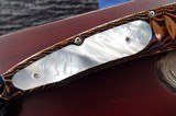 WILLIAM HENRY STUDIO KNIFE ~ Limited Edition #13/50
MODEL B07 HOKUSAI Mokume / Mother Of Pearl /OPALS
with clip case
& display box NIB - 5 of 11
