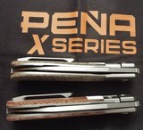 Enrique Pena
X-Series Dogleg Jack Knife Front Flipper by REATE NIB
(Brown or Green) Authorized Dealer - 3 of 5
