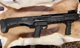 DP-12 double pump, as-new condition with laser dot on rail. - 1 of 4
