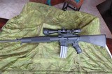 Bushmaster XM-15-E2S Tactical Sightron S1-4-12X40 - 1 of 4