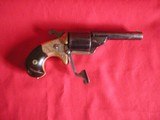 NATIONAL ARMS COMPANY 32 CAL. ENGRAVED ANTIQUE TEATFIRE REVOLVER WITH SCARCE PIVOTING
EXTRACTOR 3.25 INCH ROUND BARREL - 2 of 8
