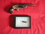 NATIONAL ARMS COMPANY 32 CAL. ENGRAVED ANTIQUE TEATFIRE REVOLVER WITH SCARCE PIVOTING
EXTRACTOR 3.25 INCH ROUND BARREL - 1 of 8