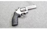 Smith & Wesson ~ 617-6 ~ .22 LR. - 1 of 5