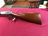 Model 55 winchester in solid frame. - 8 of 14