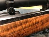 Ruger M77 4x walnut stock
must see - 1 of 10