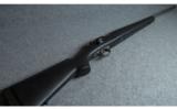 Remington Model 700 Titanium .300 Rem - 1 of 9