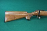 Browning A-Bolt .22 LR Checkered Glossy Walnut Stock with Rosewood fore end and grip caps, high polish blue.
Excellent Condition. - 17 of 19