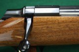 Browning A-Bolt .22 LR Checkered Glossy Walnut Stock with Rosewood fore end and grip caps, high polish blue.
Excellent Condition. - 14 of 19
