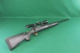 Remington 700 Bolt Action .30-06 Synthetic Stock Rifle With Redfield Lo-Pro 3-9 variable scope - 1 of 19