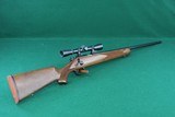 Kimber 22 Hunter .22 LR Bolt Action Rifle W/Checkered Walnut Stock and LEUPOLD ALASKAN 4X DUPLEX SCOPE