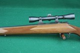 Kimber 22 Hunter .22 LR Bolt Action Rifle W/Checkered Walnut Stock and LEUPOLD ALASKAN 4X DUPLEX SCOPE - 8 of 21