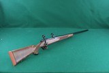 Winchester Model 70 SUPER GRADE 7MM Remington Magnum Bolt Actioin Rifle With Fancy Checkered Walnut Stock