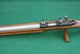 Cooper Firearms of Montana 57M LVT .22 LR Bolt Action Rifle with Stainless Varmint Barrel and Checked Walnut Stock - 11 of 23