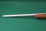 Cooper Firearms of Montana 57M LVT .22 LR Bolt Action Rifle with Stainless Varmint Barrel and Checked Walnut Stock - 9 of 23