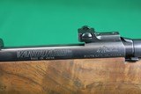 Weatherby Vanguard 7mm Remington Magnum Bolt Action Rifle with Fancy Checkered Walnut Stock - 16 of 23