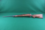 Weatherby Vanguard 7mm Remington Magnum Bolt Action Rifle with Fancy Checkered Walnut Stock - 6 of 23