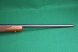 ANIB Sturm Ruger & Co. Inc. M77 Hawkeye .257 Roberts Bolt Action Rifle with Checkered Walnut Stock - 6 of 23