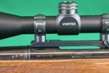 Remington Arms Co. Inc. 700 BDL Varmint Heavy Barrel .22-250 Rem Bolt Action Rifle with Checkered Walnut Stock & Vortex Scope - 17 of 25