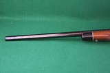 Remington Arms Co. Inc. 700 BDL Varmint Heavy Barrel .22-250 Rem Bolt Action Rifle with Checkered Walnut Stock & Vortex Scope - 9 of 25