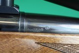 Remington Arms Co. Inc. 700 BDL Varmint Heavy Barrel .22-250 Rem Bolt Action Rifle with Checkered Walnut Stock & Vortex Scope - 18 of 25