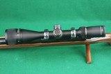 Remington Arms Co. Inc. 700 BDL Varmint Heavy Barrel .22-250 Rem Bolt Action Rifle with Checkered Walnut Stock & Vortex Scope - 11 of 25