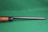 Remington Arms Co. Inc. 700 BDL Varmint Heavy Barrel .22-250 Rem Bolt Action Rifle with Checkered Walnut Stock & Vortex Scope - 5 of 25