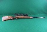 Remington Arms Co. Inc. 700 BDL Varmint Heavy Barrel .22-250 Rem Bolt Action Rifle with Checkered Walnut Stock & Vortex Scope - 2 of 25