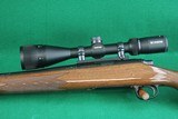 Remington Arms Co. Inc. 700 BDL Varmint Heavy Barrel .22-250 Rem Bolt Action Rifle with Checkered Walnut Stock & Vortex Scope - 8 of 25