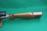 Remington Arms Co. Inc. 700 BDL Varmint Heavy Barrel .22-250 Rem Bolt Action Rifle with Checkered Walnut Stock & Vortex Scope - 10 of 25