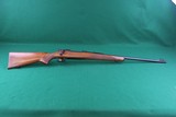 Winchester 70 Pre 64 7MM Bolt Action Rifle with Checkered Walnut Stock