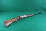 Winchester 70 Pre 64 7MM Bolt Action Rifle with Checkered Walnut Stock