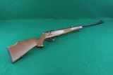 ANSCHUTZ 1515-1516 .22 WMR Bolt Action Rifle with Checkered Walnut Stock