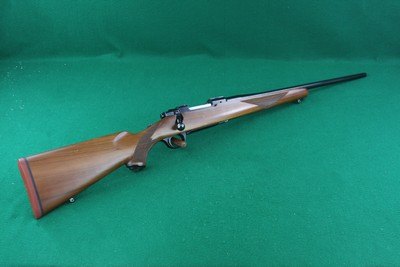 Sturm Ruger 7 Co. Inc. Red Pad M77 .243 Winchester Bolt Action Rifle with Checkered Walnut Stock