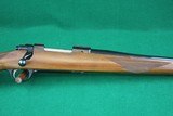 Sturm Ruger 7 Co. Inc. Red Pad M77 .243 Winchester Bolt Action Rifle with Checkered Walnut Stock - 4 of 22
