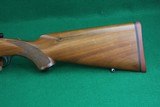 Sturm Ruger 7 Co. Inc. Red Pad M77 .243 Winchester Bolt Action Rifle with Checkered Walnut Stock - 7 of 22