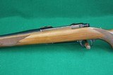 Sturm Ruger 7 Co. Inc. Red Pad M77 .243 Winchester Bolt Action Rifle with Checkered Walnut Stock - 8 of 22
