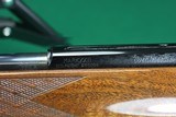 Weatherby XXII .22 LR Tube Feed Semi-Automatic Rifle with Fancy Checkered Walnut Stock - 16 of 22