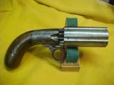 #3822 Coopers Patent Ring-triggered six shot 34cal Pepperbox, English manufacture
- 1 of 10