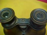#649
Binoculars, unmarked brass/steel bodied
- 3 of 4